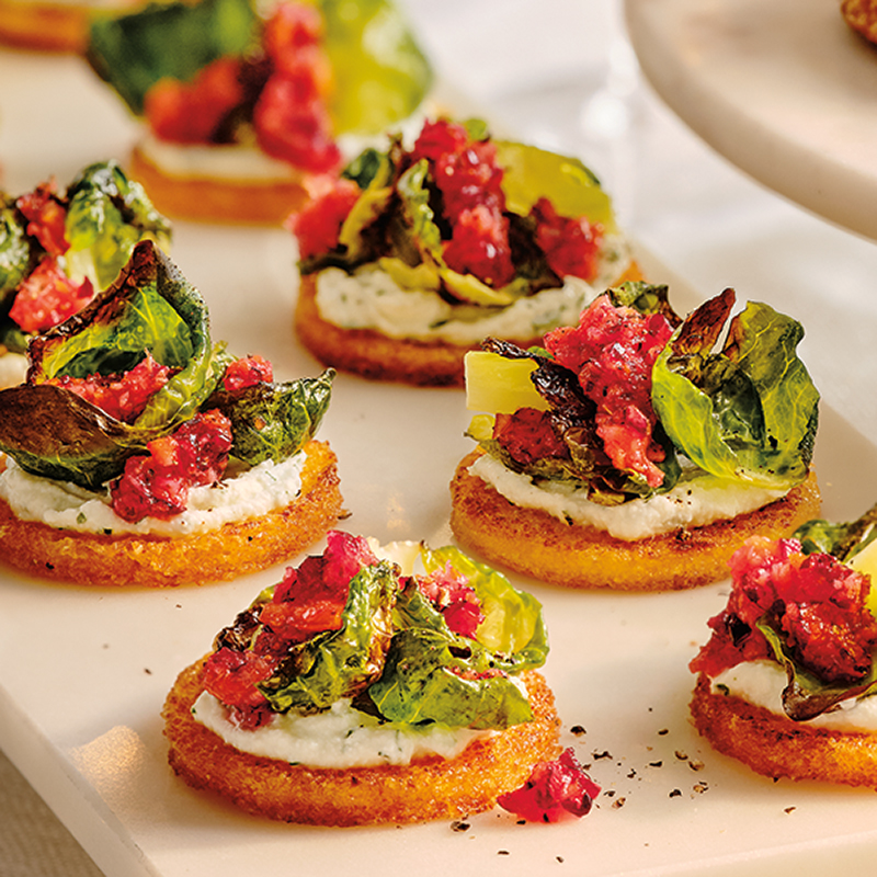 POLENTA ROUNDS WITH CRISPY BRUSSELS SPROUTS & CRANBERRY-ORANGE RELISH